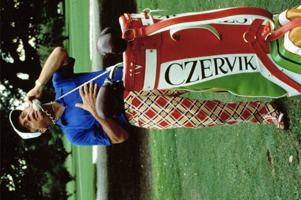 Czervik taking a phone call from his golf bag.