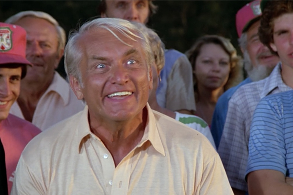 Ted Knight's character impatient at the last hole